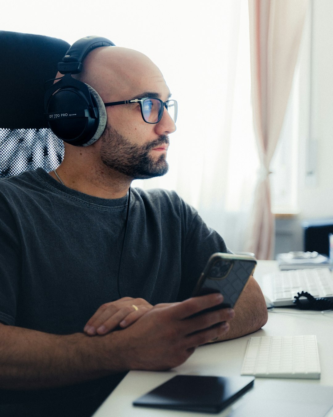 person listening to podcast on phone